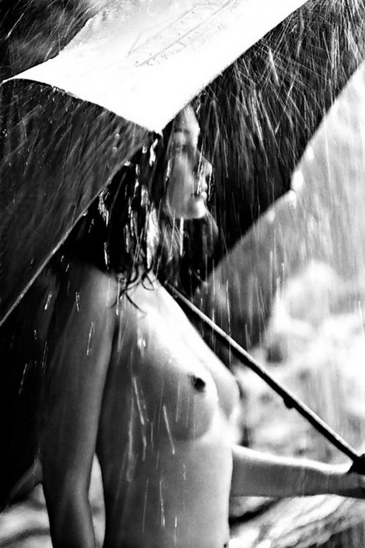 Naked women in the rain
