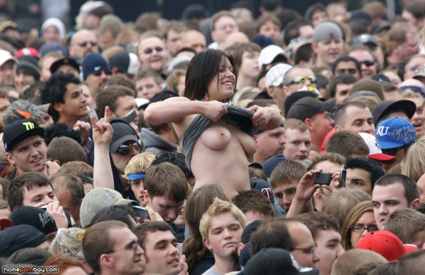 Expose breasts at the festival