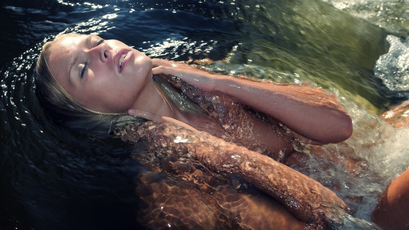 Indian Bathing in River
