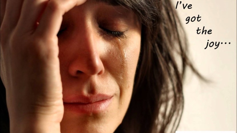 The girl cries with happiness