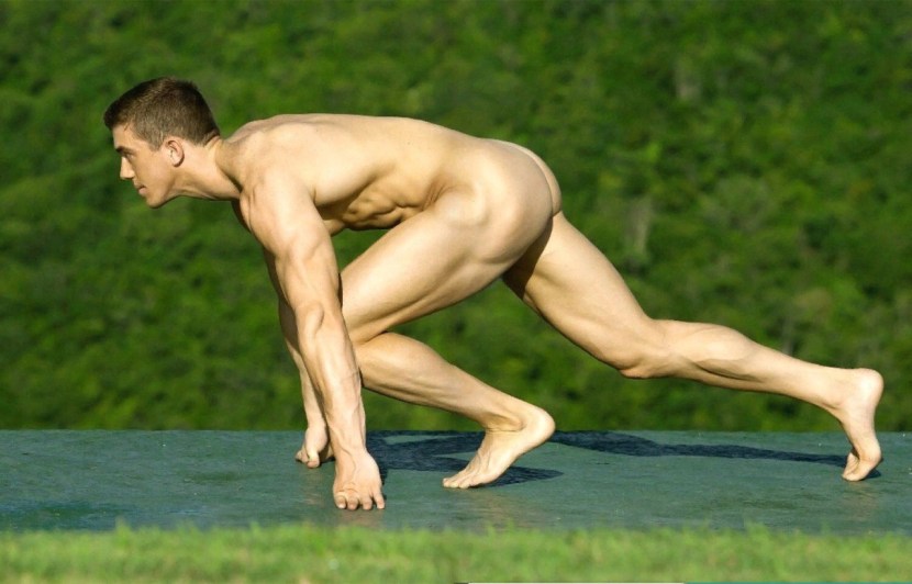 A naked athlete runs
