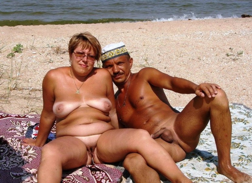 Mature pairs on a nudist beach