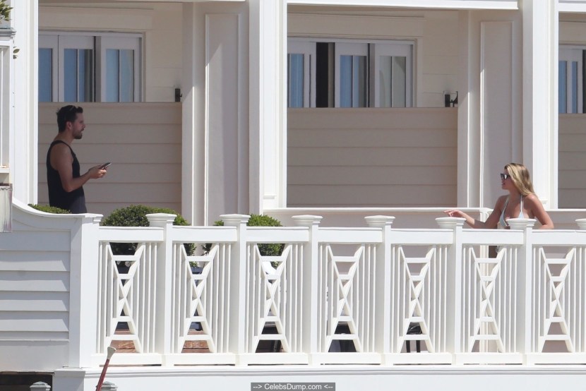 Lit up on the balcony naked