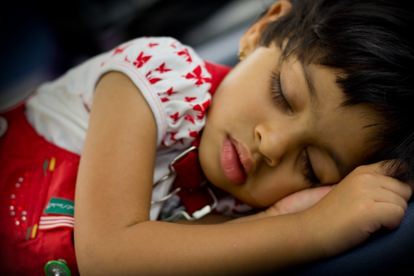 The child is sleeping a vector