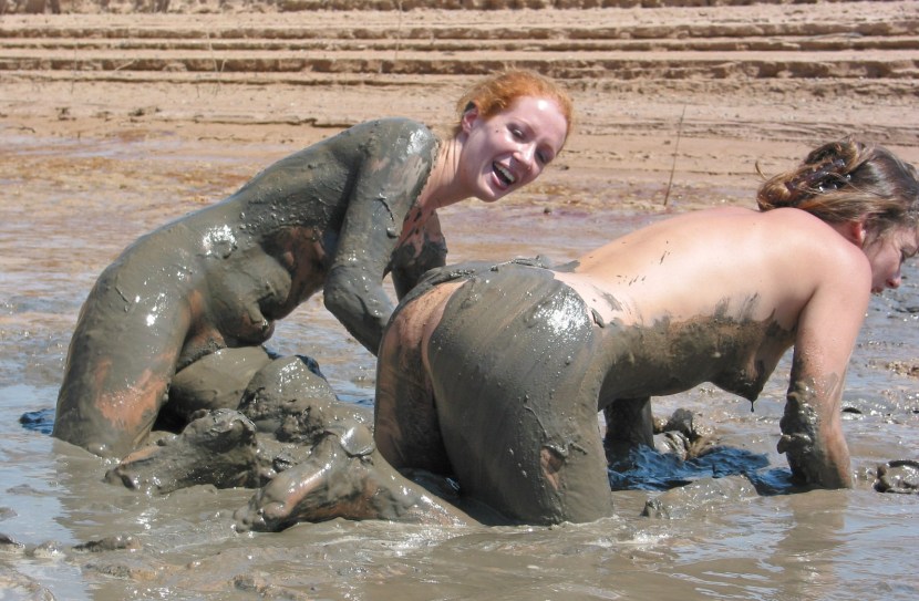 Girls in the mud bathing