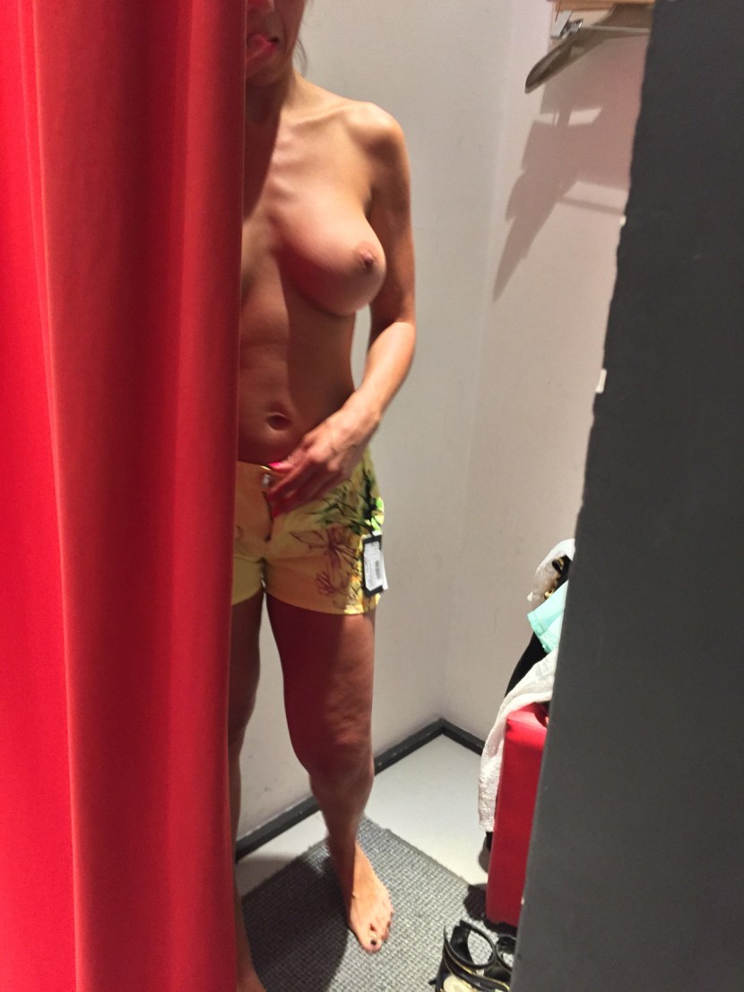 Girl in the fitting topless