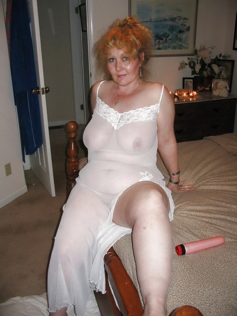 Mature in transparent clothes naked
