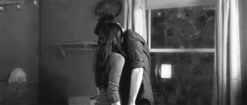 Passionately pressed against the wall