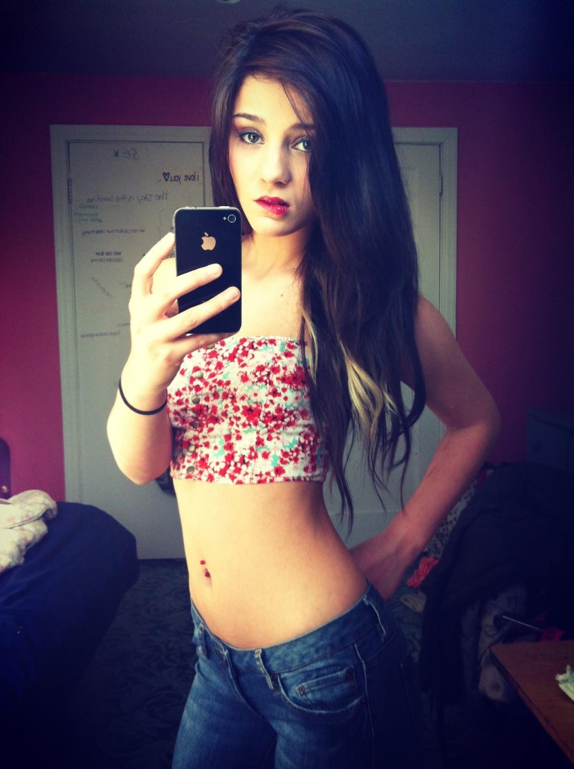 Brunette with freckles and green eyes