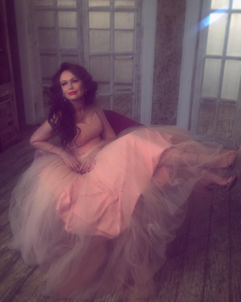 Girl at sunset by the sea