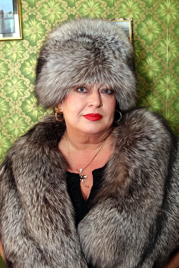 Women in fur coats and boots