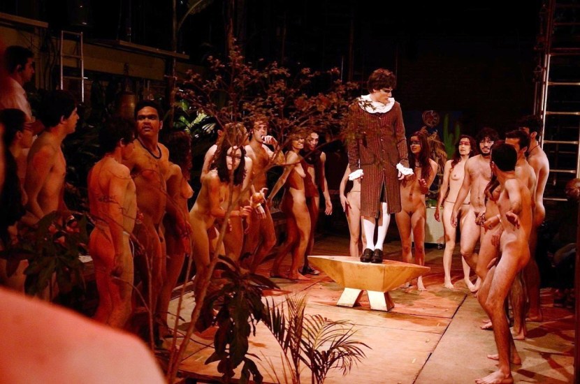 Naked actors on the stage of the theater
