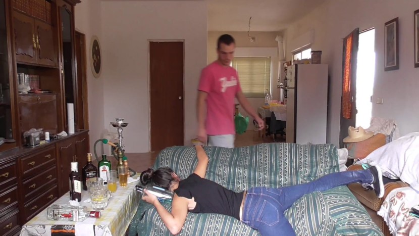 The young guy watered the girl