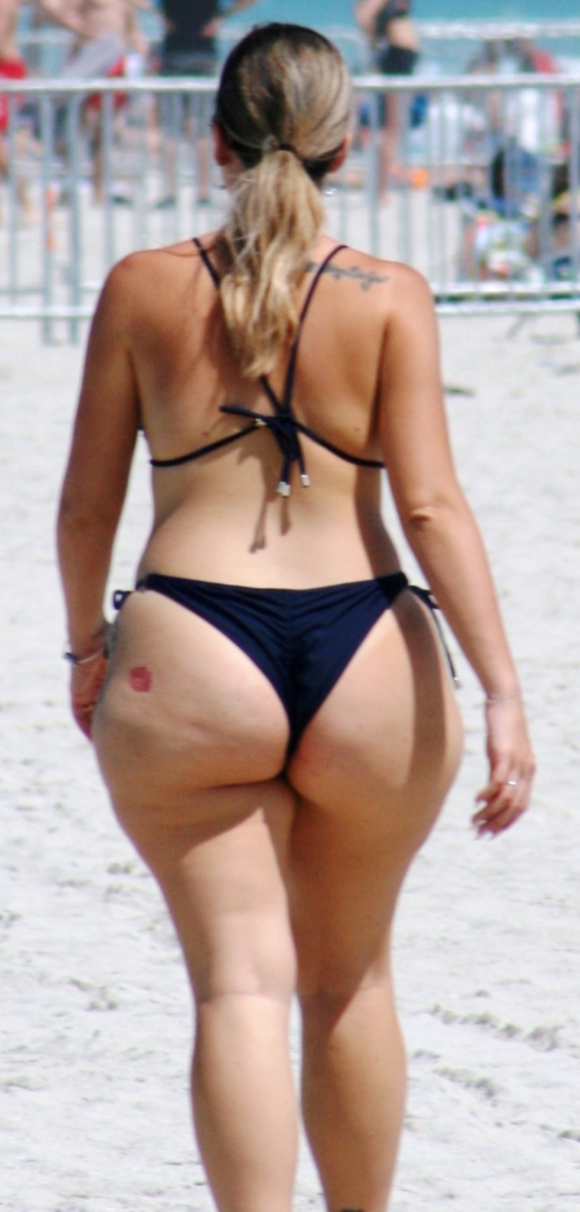 Law of girls in shorts on the beach