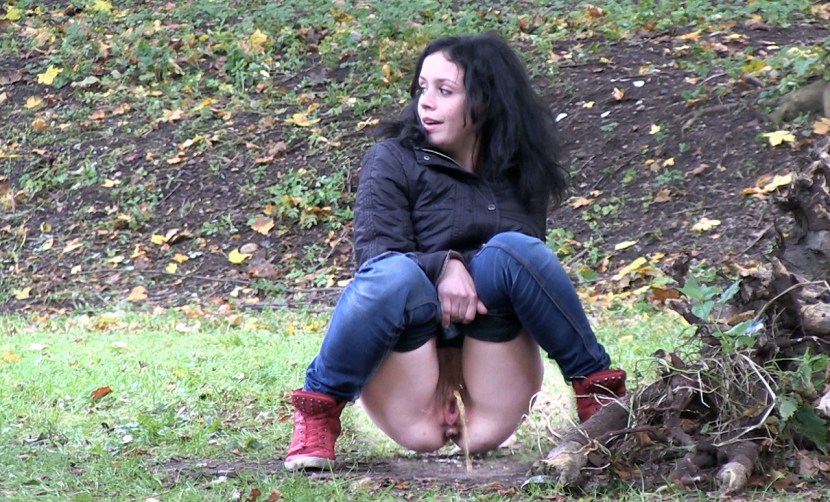 Female pissing in nature