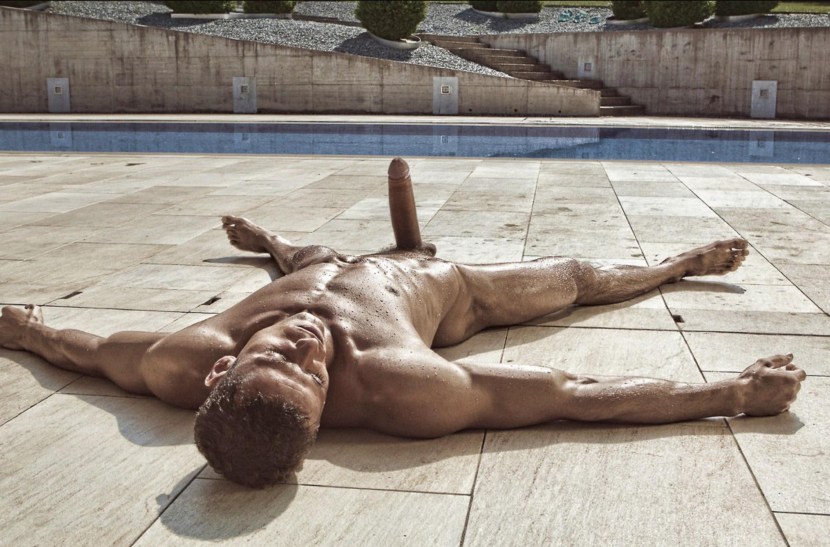 A naked guy sat on a twine