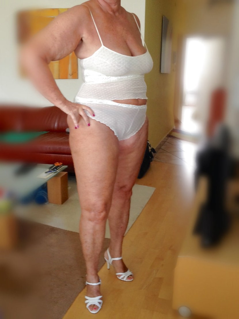 Grandma in a dress striptease