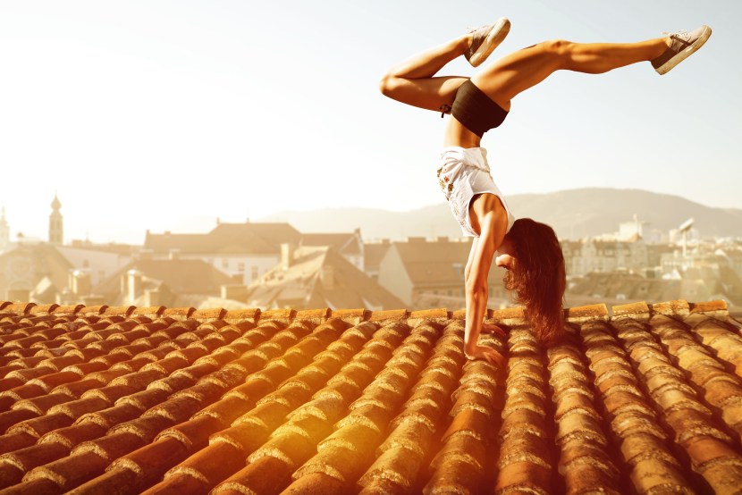 Girl dances on the roof