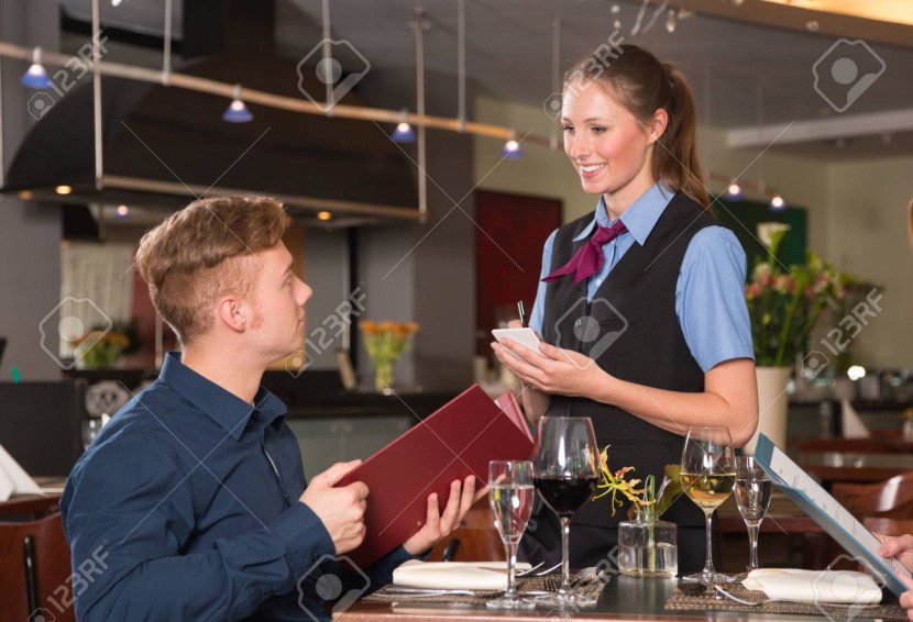 The waitress is in the conversation