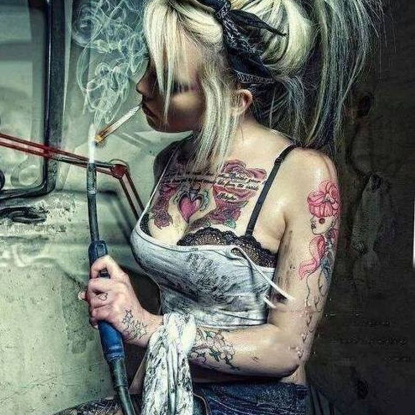 Girl with tattoo and cigarette