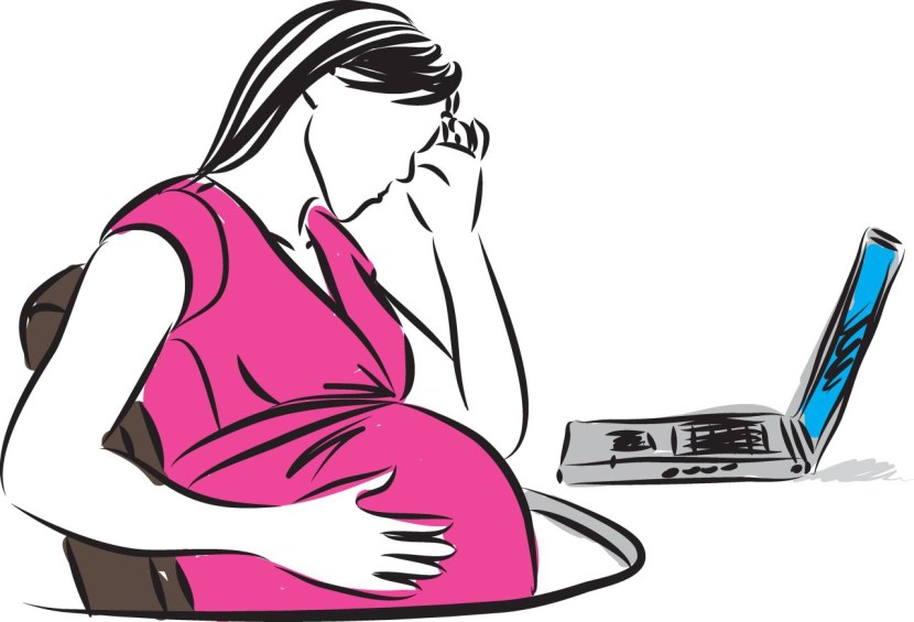 The pregnant woman laughs