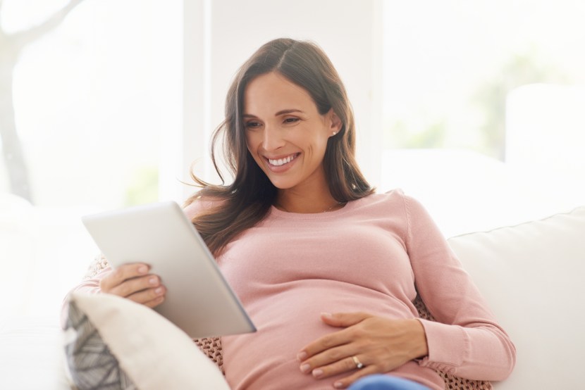 Pregnant woman with a smartphone
