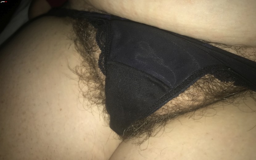 Hairy pubes through panties
