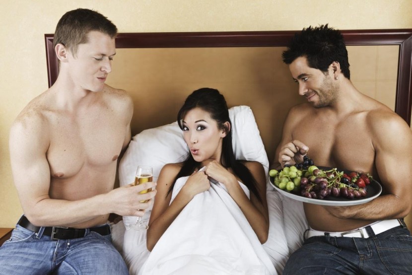 Beautiful woman and two men