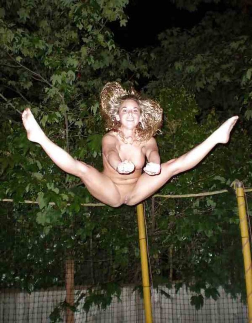 Naked women jump on a trampoline