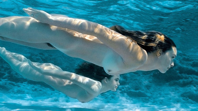 Naked beauties underwater