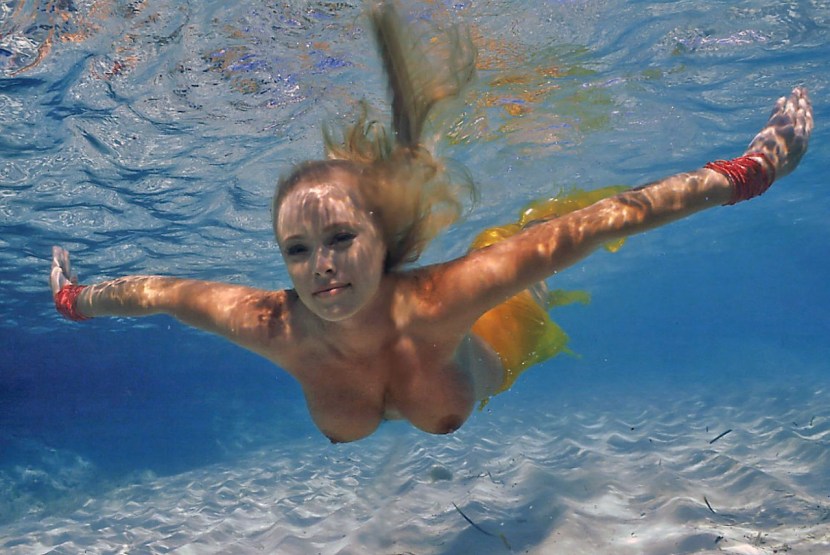 Under water without a swimsuit