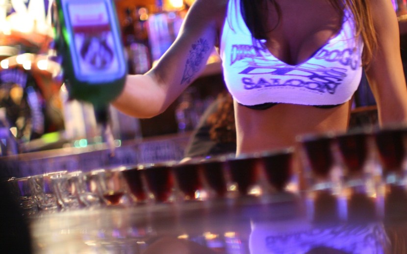 Girl dances in a bar