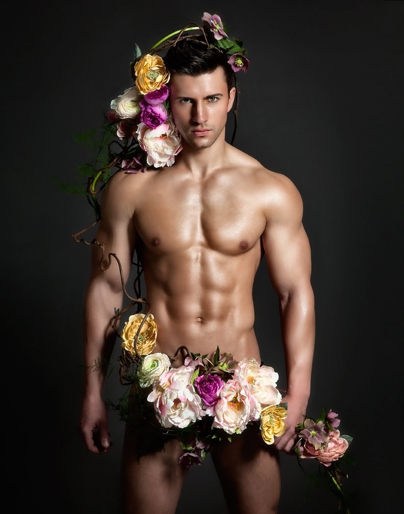 Beautiful man with flowers