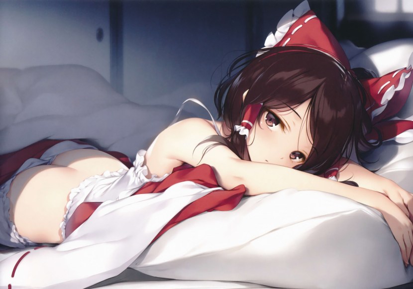 Anime girl lies on the bed