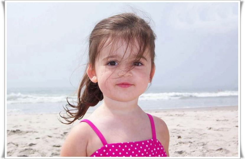 Dad and daughter at sunset