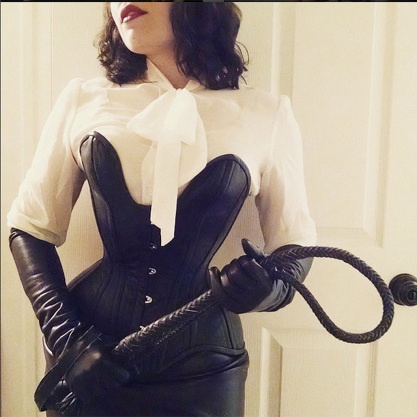 Man kisses female legs