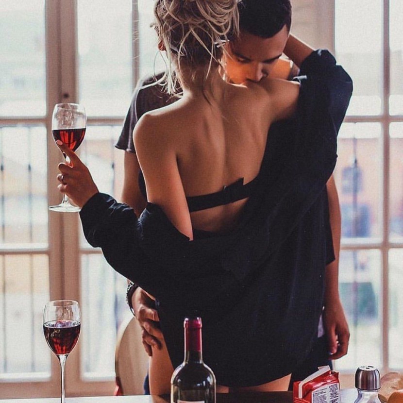 Girl and guy with wine