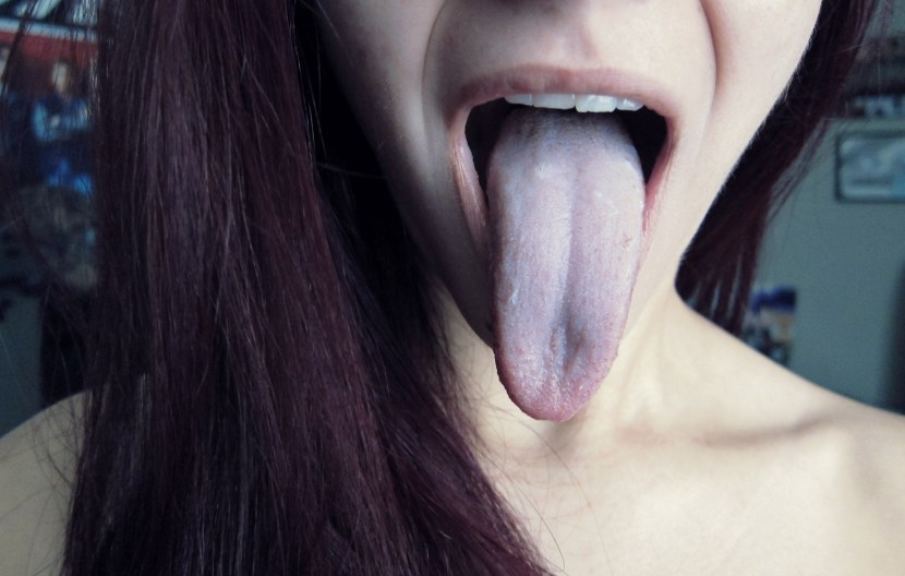 Long tongue in the girl kiss