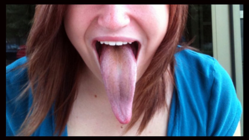 The guy licks a huge clitoris