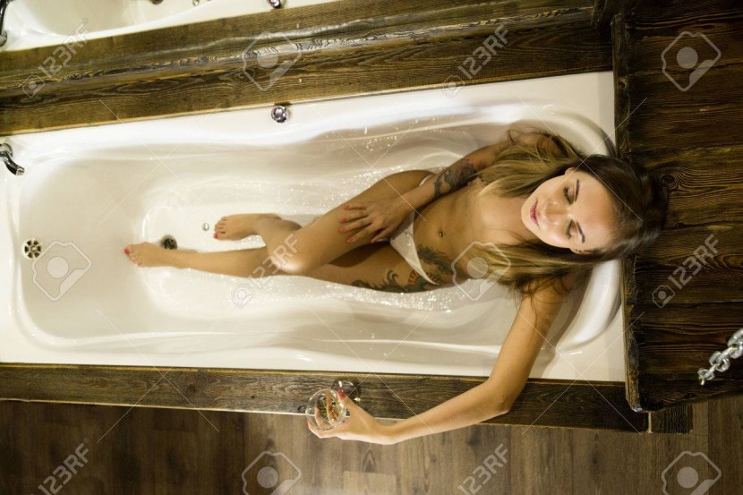 Photoshoot in the bathroom in a shirt