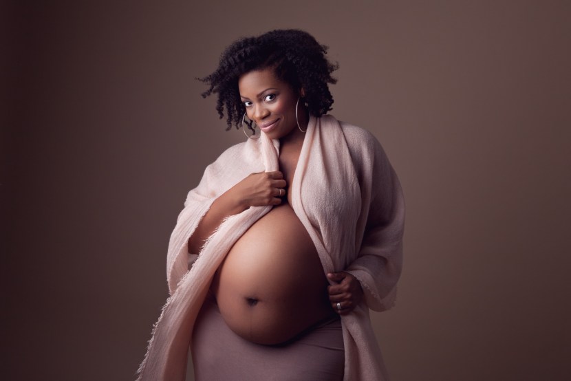 A pregnant woman is sleeping