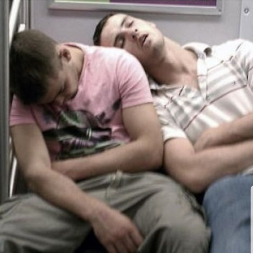 The man sleeps on the bus