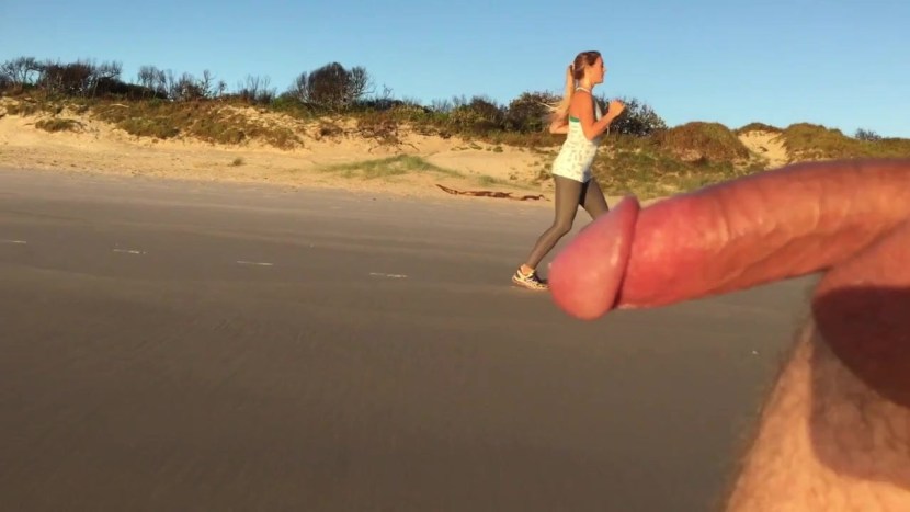 Naked men and women on the beach