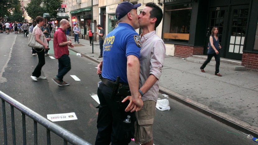 Men kiss on the street