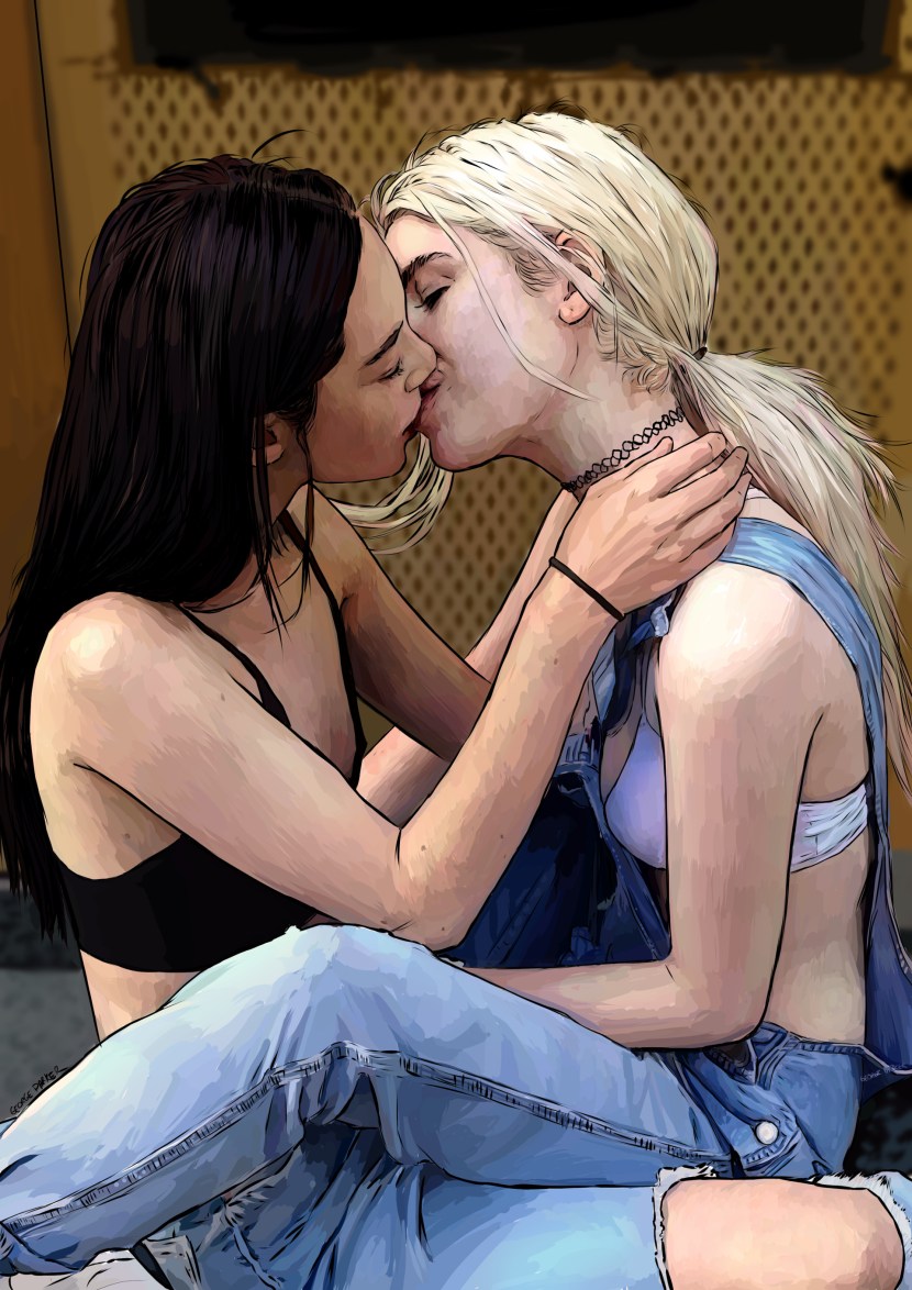 Blonde and brunette kiss