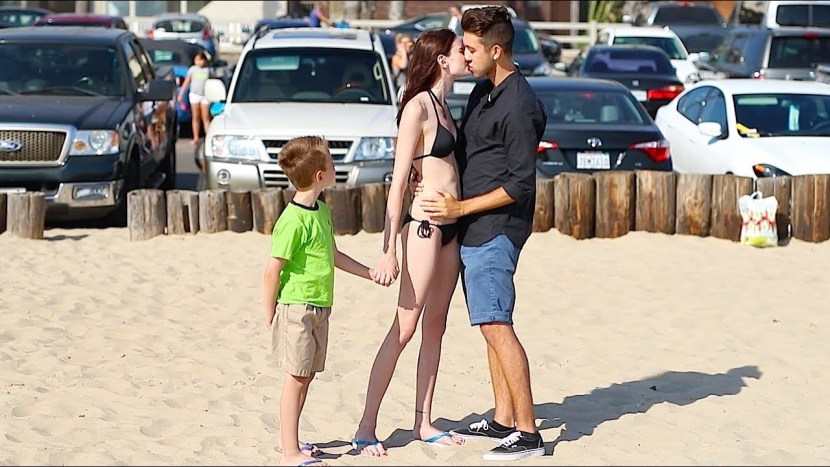 Naked man in front of children