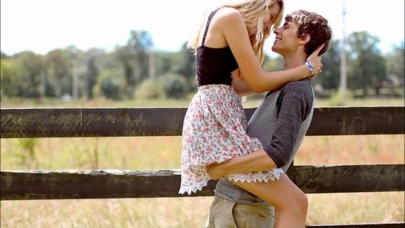 The guy raises the girl