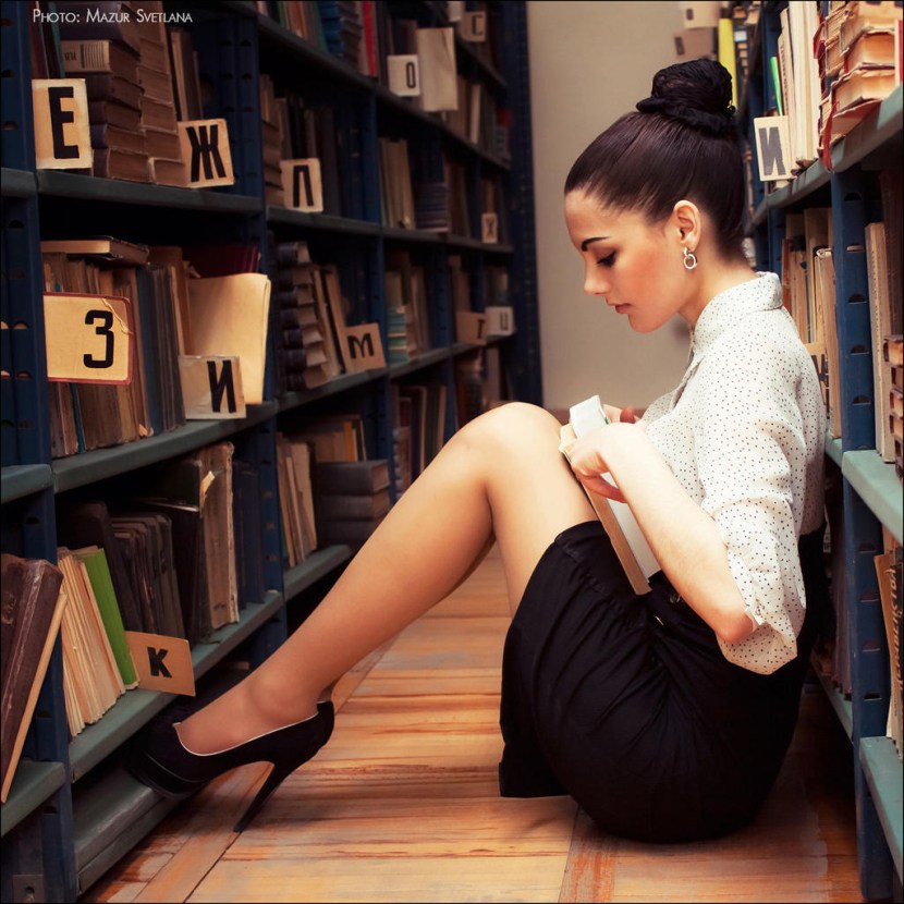 Beautiful girl with a book