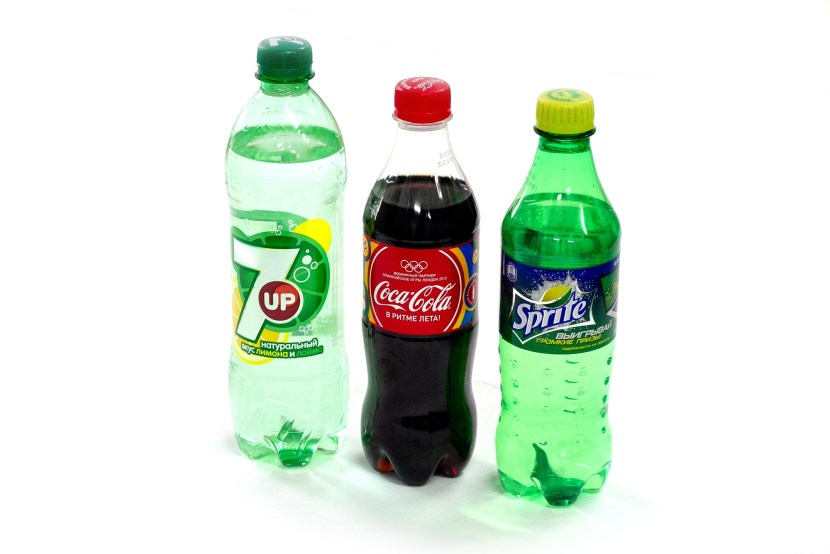 Cola in a glass with a tube