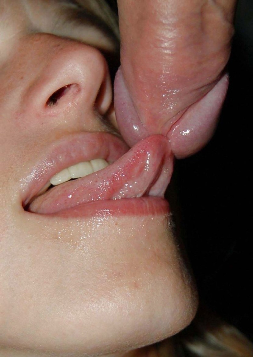 Girl licks the head of a penis